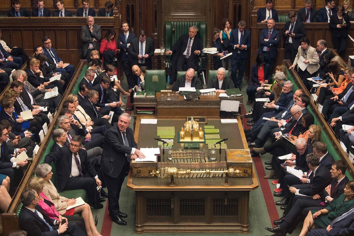 This handout photograph taken and released by the UK Parliament on 29 March 2019 shows Britain`s Attorney General Geoffrey Cox stand and speak during a debate in the House of Commons on the Government`s EU Withdrawal Agreement Bill. Photo: AFP