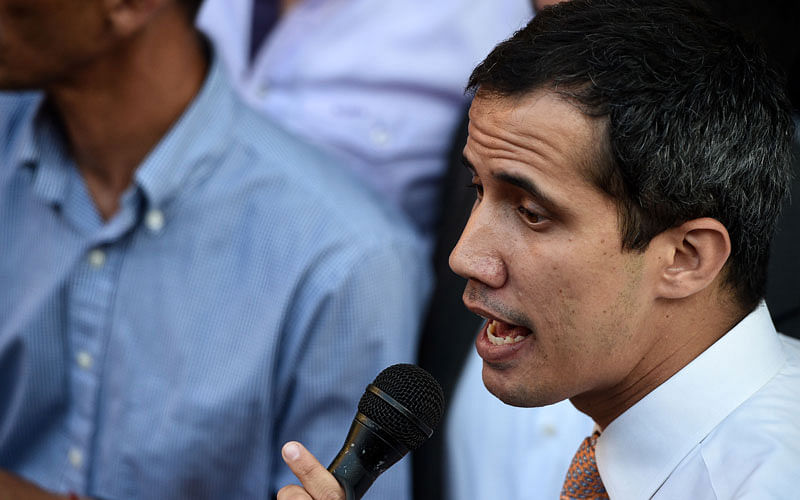 Venezuelan opposition leader and self-proclaimed interim president Juan Guaido speaks during a rally in San Bernardino neighbourhood in Caracas on 1 April. AFP File Photo