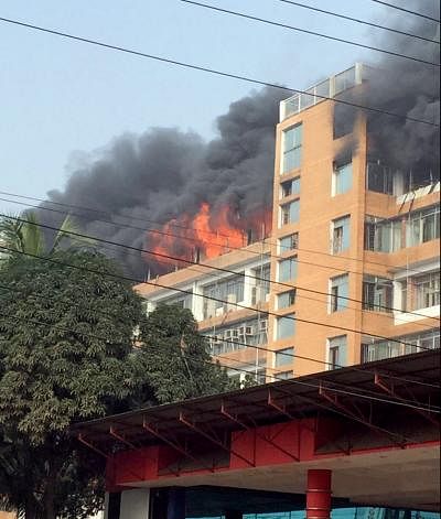 Fire service units try to douse the fire a sweater factory in Signboard area of Gazipur city. File photo