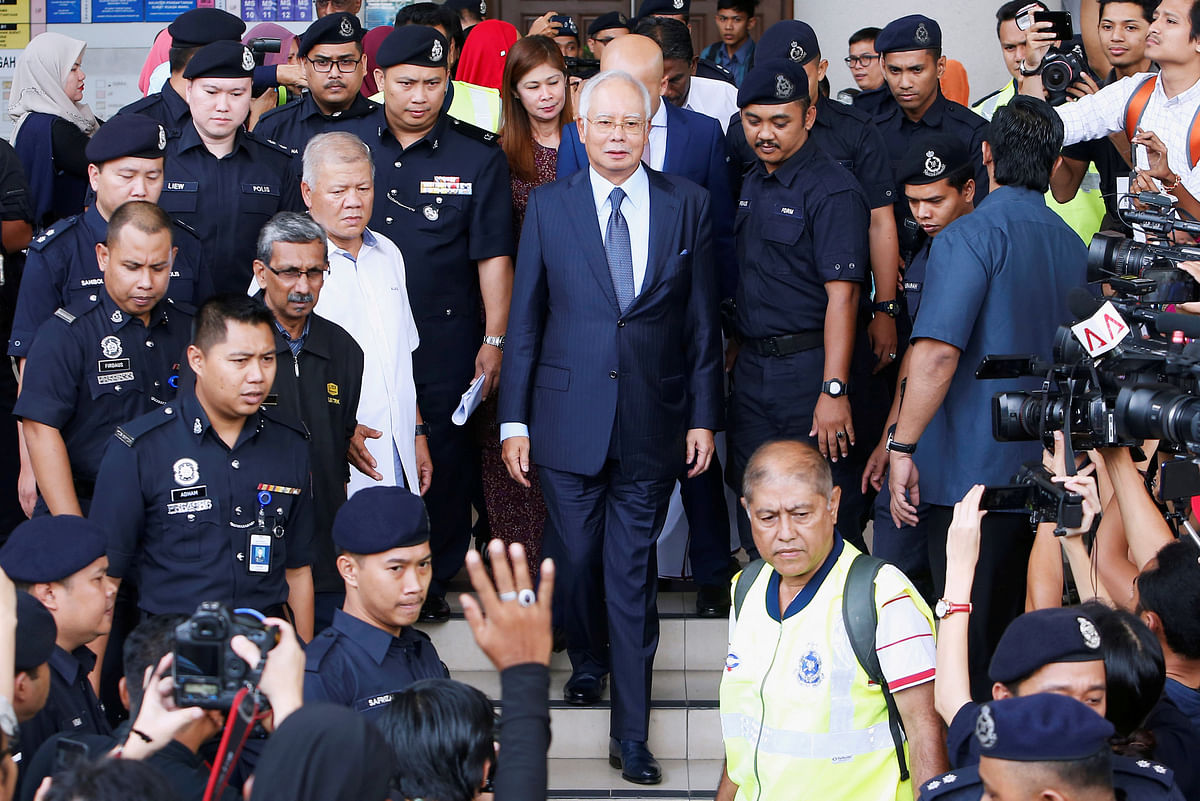 Malaysia`s former prime minister Najib Razak leaves a court in Kuala Lumpur, Malaysia on 4 October 2018. Photo: Reuters
