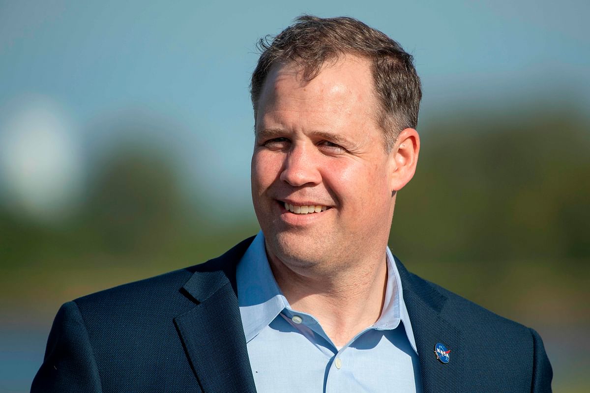 In this file photo taken on 01 March 2019 NASA administrator Jim Bridenstine speaks during a press conference at the Kennedy Space Center in Florida. NASA has made it clear they want astronauts back on the Moon in 2024, and now, they are zeroing in on the Red Planet -- the US space agency confirmed that it wants humans to reach Mars by 2033.Jim Bridenstine, NASA`s administrator, said 2 April 2019 that in order to achieve that goal, other parts of the program -- including a lunar landing -- need to move forward more quickly. Photo: AFP