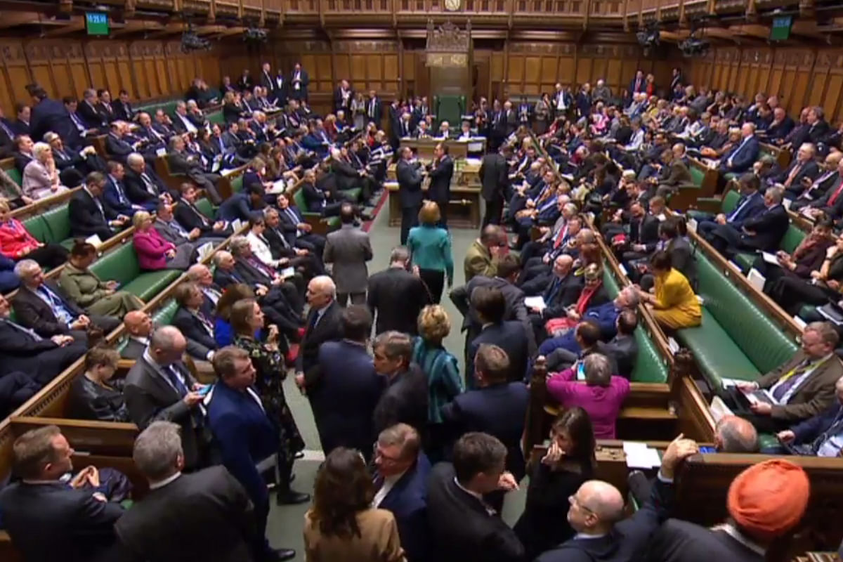 A video grab from footage broadcast by the UK Parliament`s Parliamentary Recording Unit (PRU) shows MPs waiting in the chamber for the result of a vote on Amendment 22 to the European Union Withdrawal (No. 5) bill, second reading, as proposed by Labour MP Yvette Cooper, in the House of Commons in London on 3 April 2019. Photo: AFP