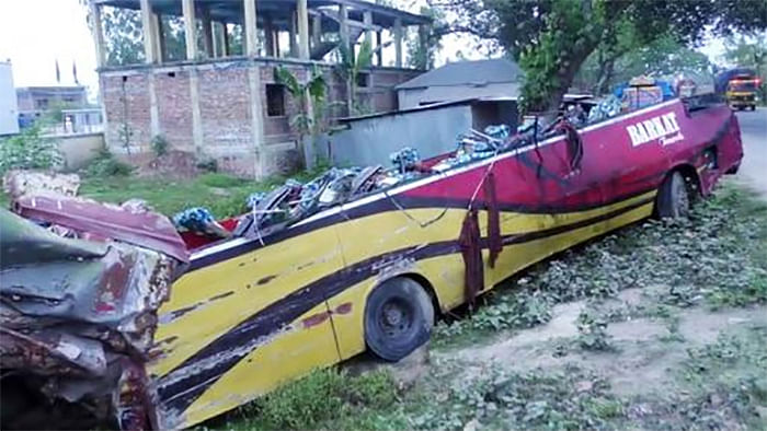 Wreckage of the bus as it overturns in Gobindaganj upazila of Gaibandha early Saturday. Photo: Shahabul Shahin