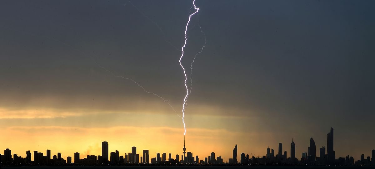 Lightning strikes the liberation tower in Kuwait City during a thunder storm on 5 April 2019. Photo: AFP