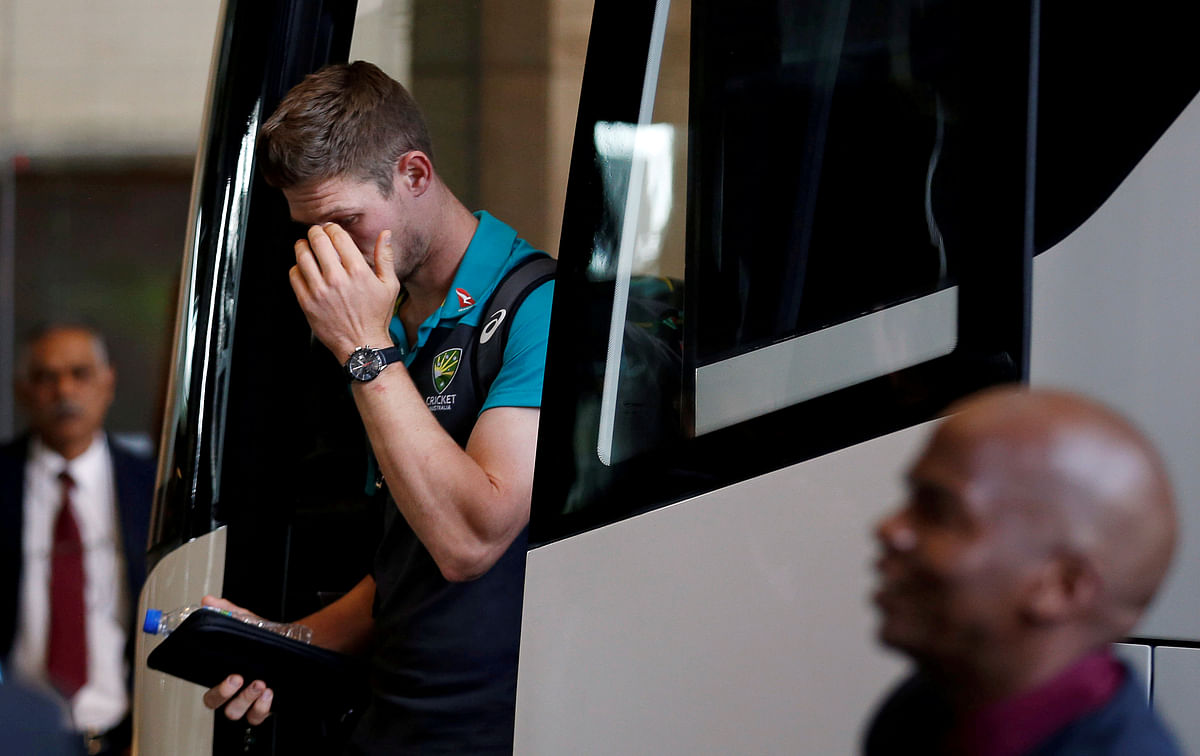 Australian cricketer Cameron Bancroft gestures as he arrives at a hotel in Sandton, South Africa on 27 March 2018. Reuters File Photo