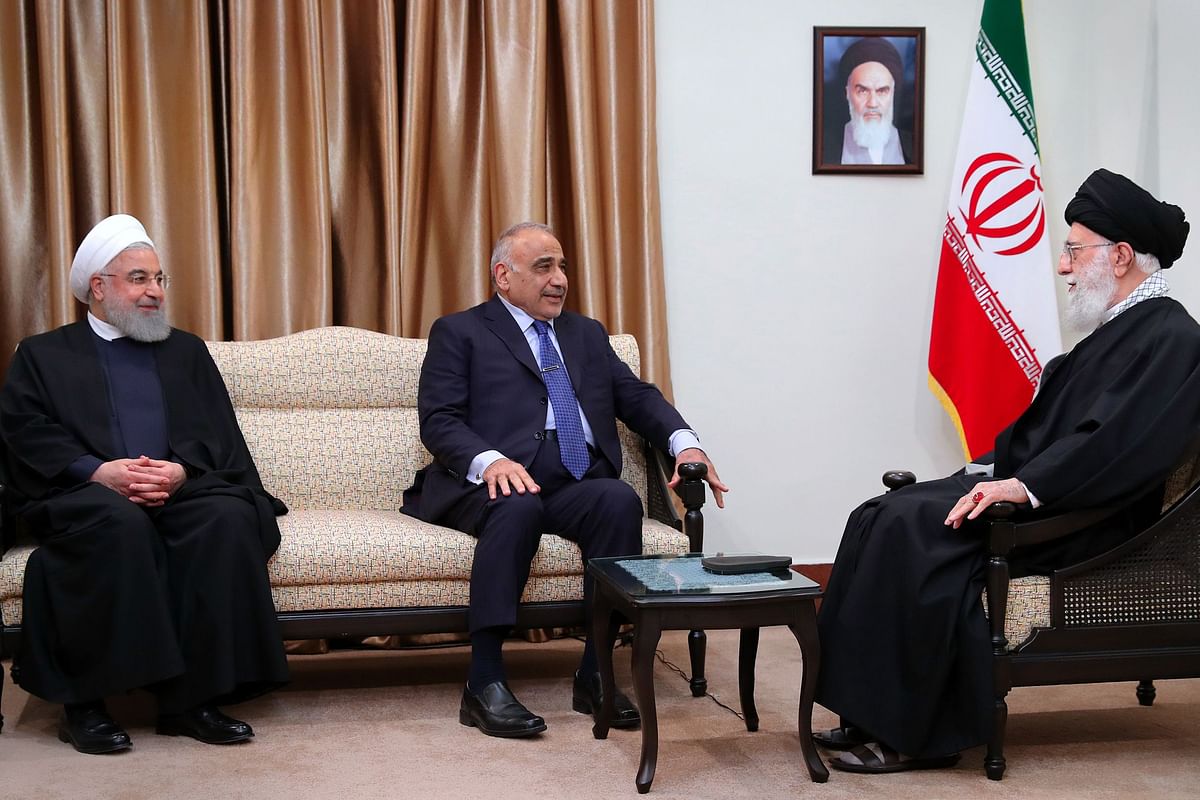 A handout picture provided by the office of Iran`s Supreme Leader Ayatollah Ali Khamenei on 6 April 2019 shows him (R) meeting with Iraqi prime minister Adel Abdel Mahdi (L) in the presence of president Hassan Rouhani in the Iranian capital Tehran. Photo: AFP