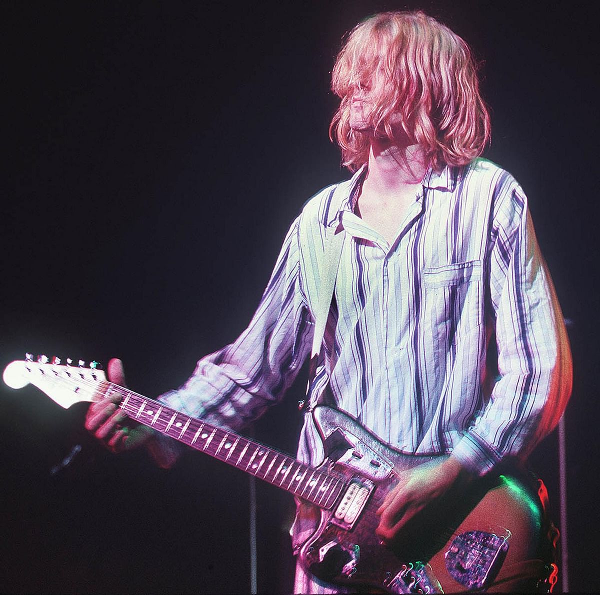 In this file photo taken on 19 February 1992, Kurt Cobain, lead singer for the US grunge rockers Nirvana, performs at the Nakano Sun Plaza in Tokyo Decades after Cobain`s haunting rasp first bewitched the global airwaves, echoes of the Nirvana frontman are still touching generations of youth who weren`t even alive when he died. Photo: AFP
