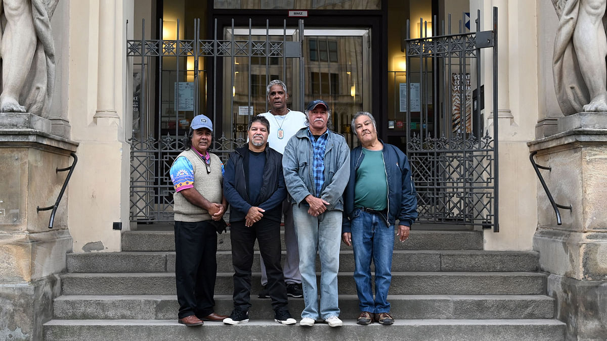 (L-R) Neville Reys, Aboriginal Gudju Gudju Fourmile, Peter Hyde, Hendrick Fourmile and Gerald Fourmile pose in front of the museum of the five continents in Munich, southern Germany, on 8 April 2019. Photo: AFP