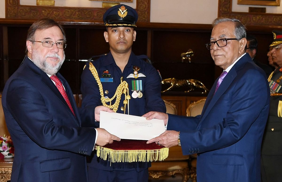 Daniel Chuburu, non-resident ambassador of Argentina, presents his credential to president Abdul Hamid at a ceremony at Bangabhaban on Wednesday. Photo: PID