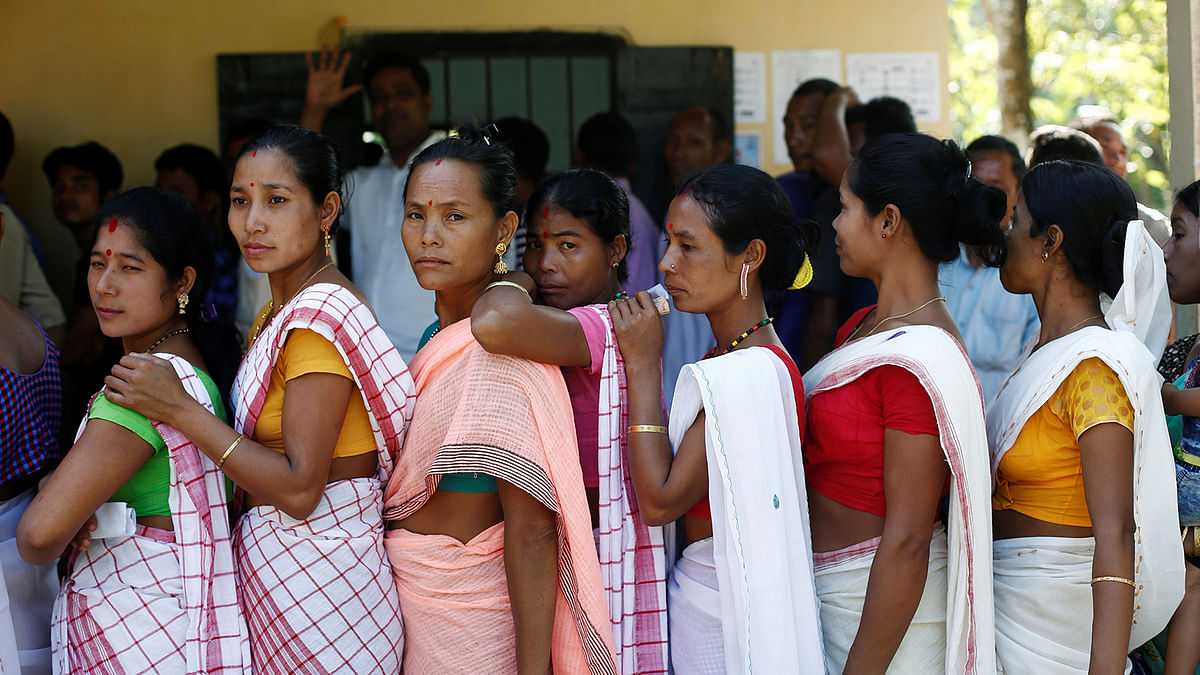 People line up to cast their votes outside a polling station in Majuli, a large river island in the Brahmaputra river, in the northeastern Indian state of Assam, India on 11 April 2019. Photo: Reuters