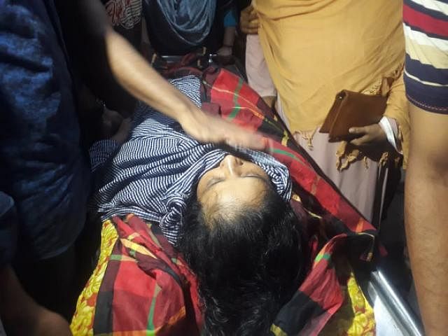 Shirin Akhter fainted after the death of her daughter and Feni madrasa girl Nusrat Jahan Rafi at Dhaka Medical College Hospital on 10 April. Photo: Asaduzzaman