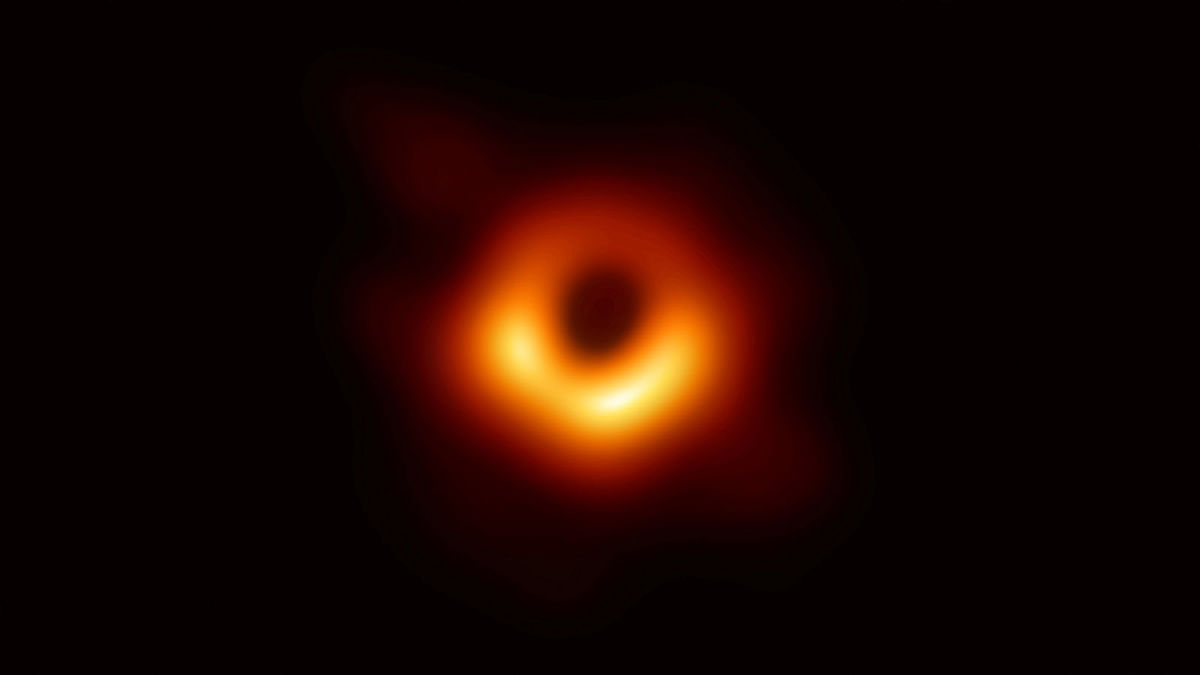 The first ever photo of a black hole, taken using a global network of telescopes, conducted by the Event Horizon Telescope (EHT) project, to gain insight into celestial objects with gravitational fields so strong no matter or light can escape, is shown in this handout photo released on 10 April 2019. Photo: Reuters