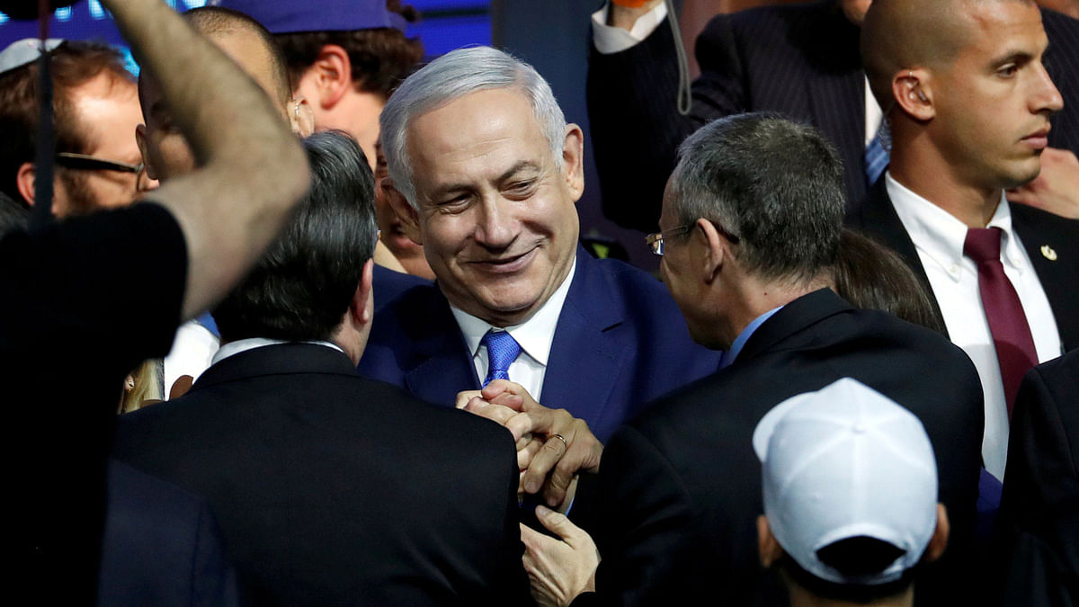Israeli prime minister Benjamin Netanyahu is greeted by supporters of his Likud party as he arrives to speak following the announcement of exit polls in Israel`s parliamentary election at the party headquarters in Tel Aviv, Israel on 10 April 2019. Photo: Reuters