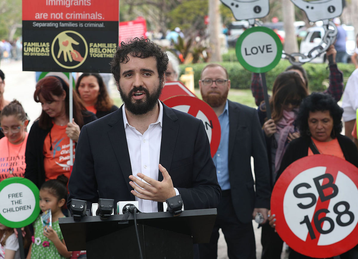 Tomas Kennedy from the Florida Immigrant Coalition speaks during a press conference, across the street from a US Immigration and Customs Enforcement (ICE) office, to announce a travel alert for the state of Florida on 10 April 2019 in Miramar, Florida. Photo: AFP