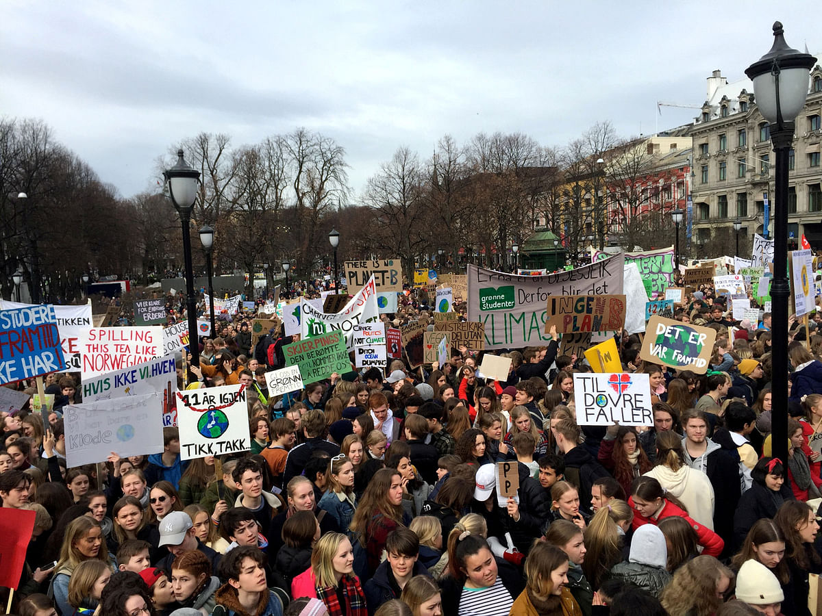 Students gather in front of the Parliament building during a protest against climate change in Oslo, Norway on 22 March 2019. Reuters File Photo