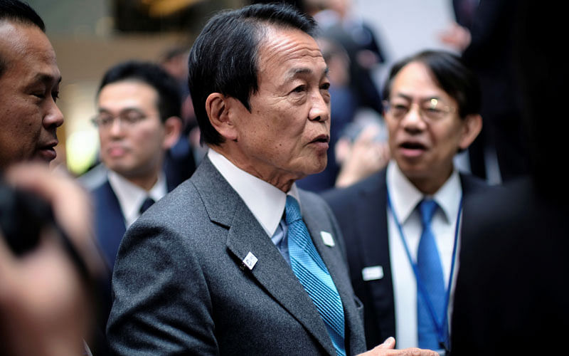 Japanese Finance Minster Taro Aso leaves the G-20 Finance Ministers and Central Bank Governors’ meeting at the IMF and World Bank’s 2019 Annual Spring Meetings, in Washington on 12 April. Photo: Reuters