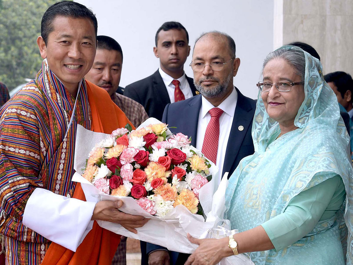 Bhutanese prime minister Lotay Tshering calls on president Abdul Hamid at Bangabhaban on Saturday.  Photo: PID
