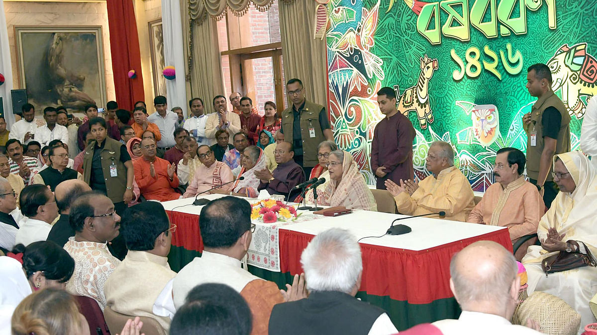 Prime minister Sheikh Hasina addresses a programme after exchanging Bangla Nababarsha greetings with the leaders and workers of her party at her official Ganabhaban residence in Dhaka on Sunday. Photo: PID