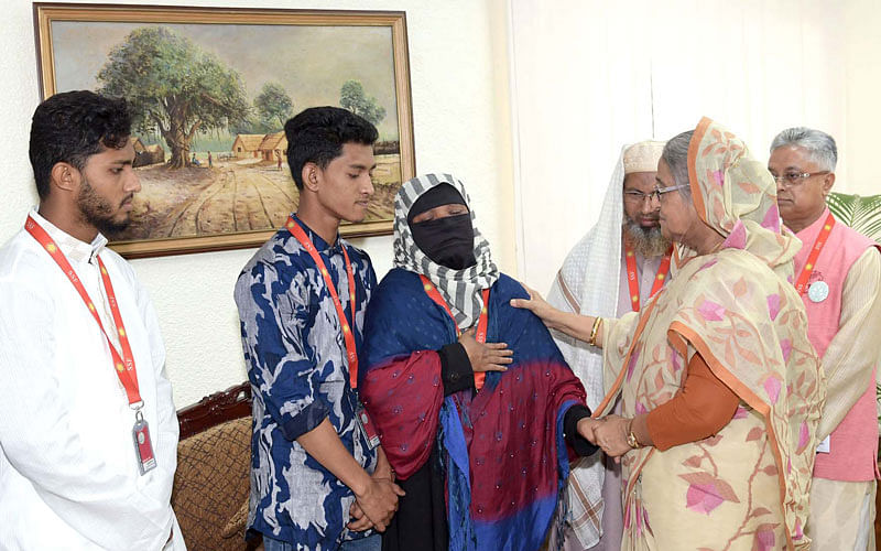 Prime minister Sheikh Hasina consoles Nusrat Jahan Rafi`s family at her office on Monday. Nusrat was recently burned to death in Sonagazi of Feni. Photo: PID