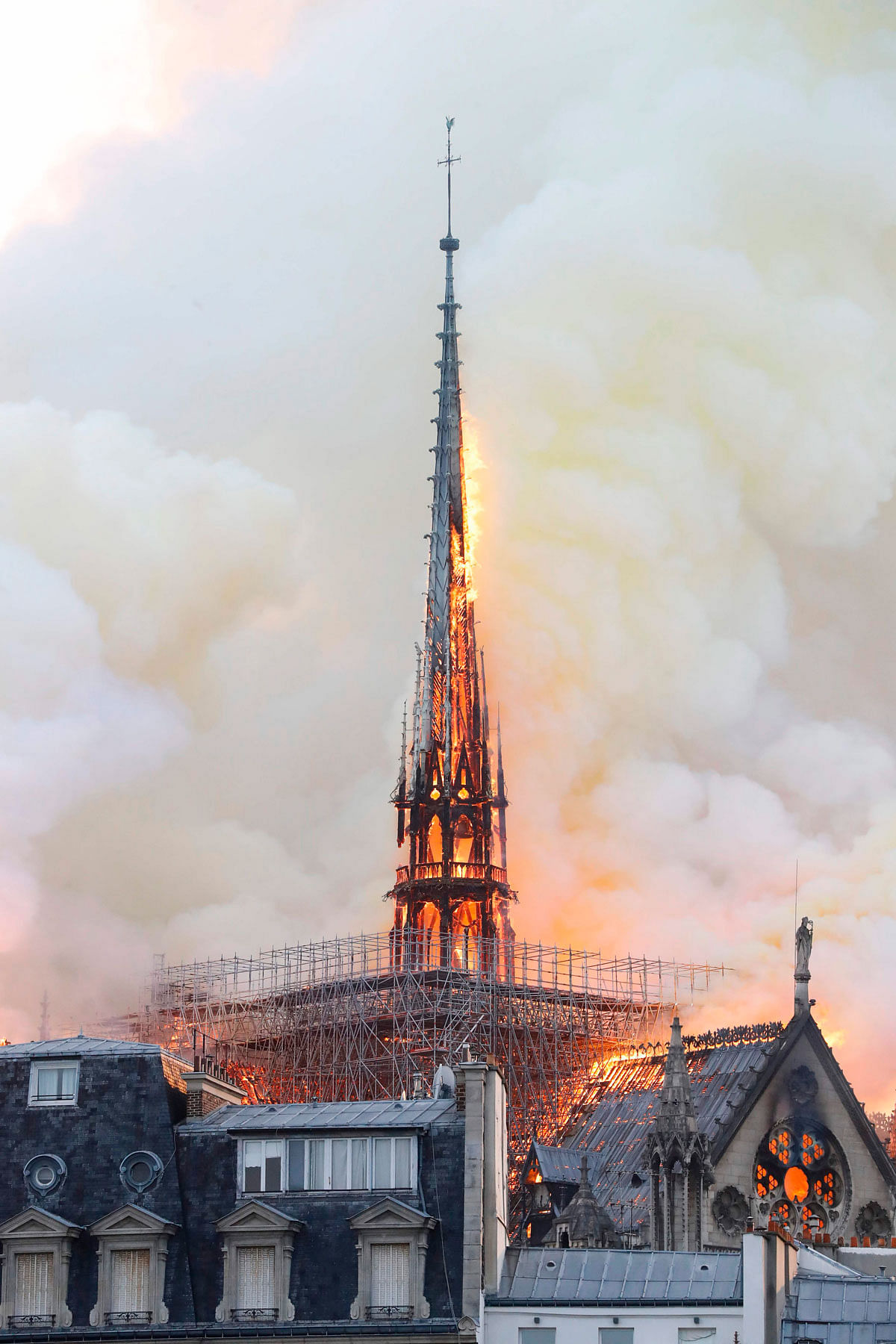 Smoke and flames rise during a fire at the landmark Notre-Dame Cathedral in central Paris on 15 April potentially involving renovation works being carried out at the site, the fire service said. Photo: AFP