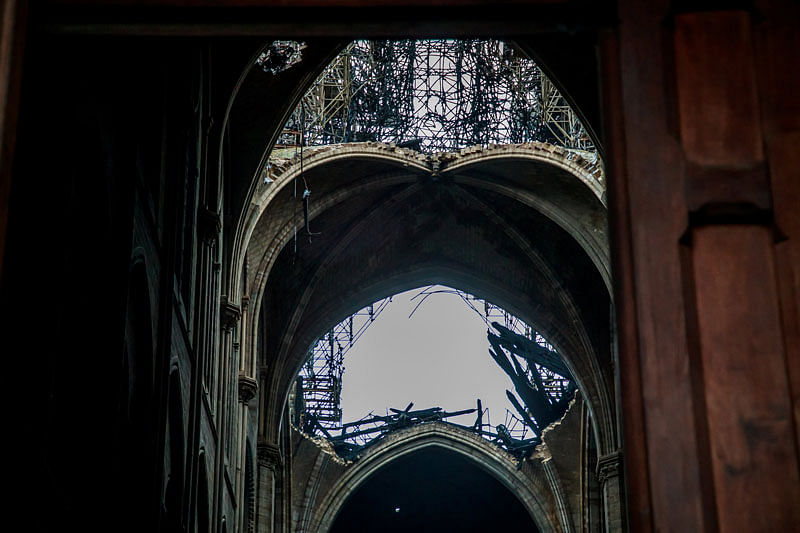 A view of the damaged roof of Notre-Dame-de Paris in the aftermath of a fire that devastated the cathedral, during the visit of French Interior Minister Christophe Castaner (not pictured) in Paris, France, on 16 April 2019. Photo: Reuters