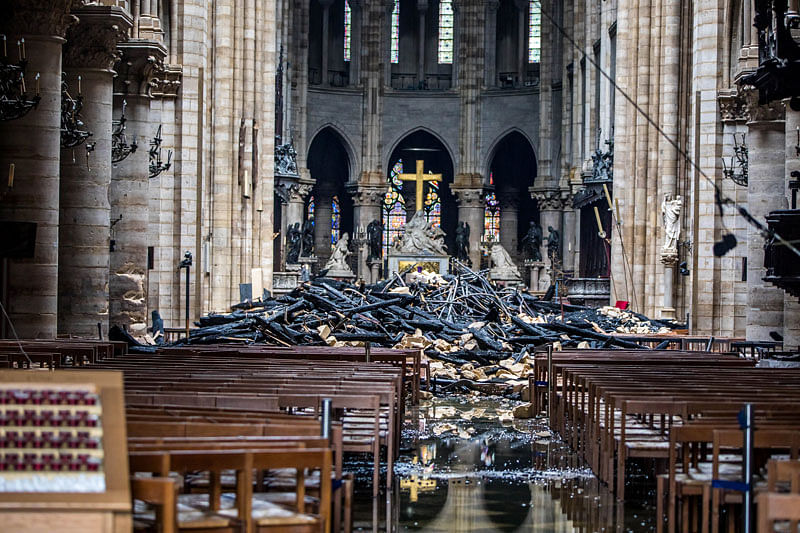 A view of the debris inside Notre-Dame de Paris in the aftermath of a fire that devastated the cathedral, during the visit of French Interior Minister Christophe Castaner (not pictured) in Paris, France, on 16 April 2019. Photo: Reuters