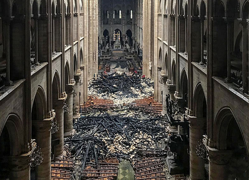 A picture taken on 16 April 2019 shows an interior view of the Notre-Dame Cathedral in Paris in the aftermath of a fire that devastated the cathedral. Photo: AFP