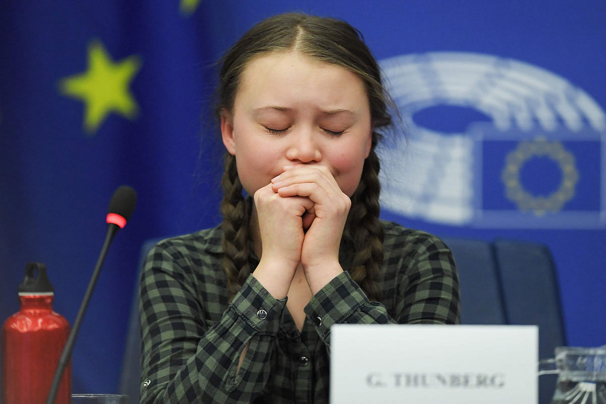 Swedish climate activist Greta Thunberg reacts during a debate with the EU Environment, Public Health and Food Safety Committee during a session at the European Parliament on 16 April 2019 in Strasbourg, eastern France. Photo: AFP