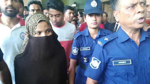 Burqa-clad Kamrun Nahar Moni, one of the main accused in Feni madrasa student Nusrat Jahan Rafi murder case, was produced before the court on Wednesday. Photo: Prothom Alo