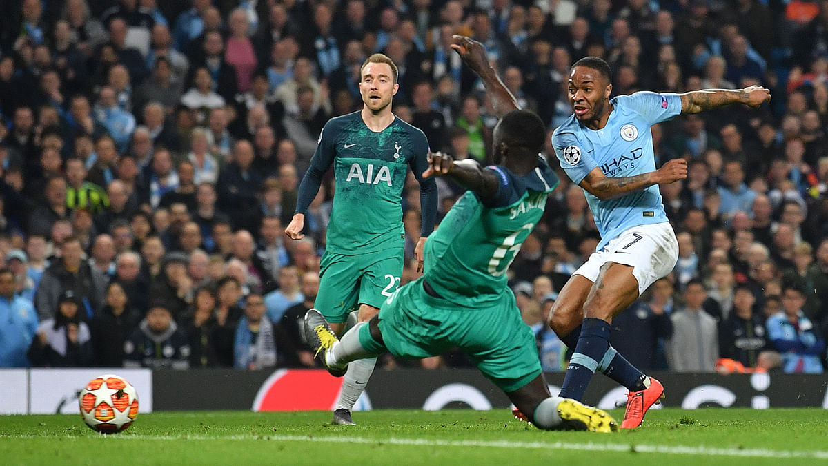 Manchester City`s English midfielder Raheem Sterling (R) scores his team`s fifth goal but has the goal dissallowed during the UEFA Champions League quarter final second leg football match between Manchester City and Tottenham Hotspur at the Etihad Stadium in Manchester, north west England on 17 April 2019. Photo: AFP