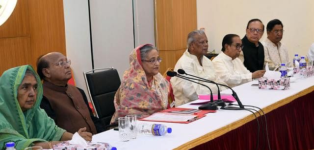 Prime minister Sheikh Hasina speaks at the joint meeting of Awami League Central Working Committee (ALCWC) and Advisory Council at party's central party office at 23 Bangabandhu Avenue in Dhaka on Friday. Photo: PID