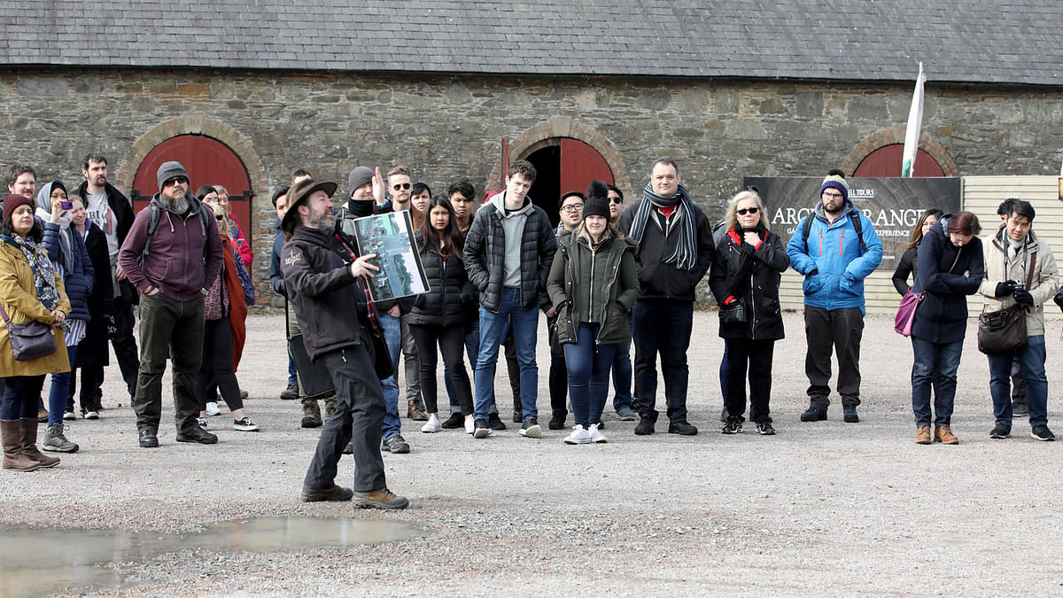 Game of Thrones fans listen to a presentation as they visit the Castle Ward Estate in Strangford, northern Ireland, on 17 April 2019 the location of Winterfell in Game of Thrones, and one of the many locations used by the hit HBO show across the province. Photo: AFP