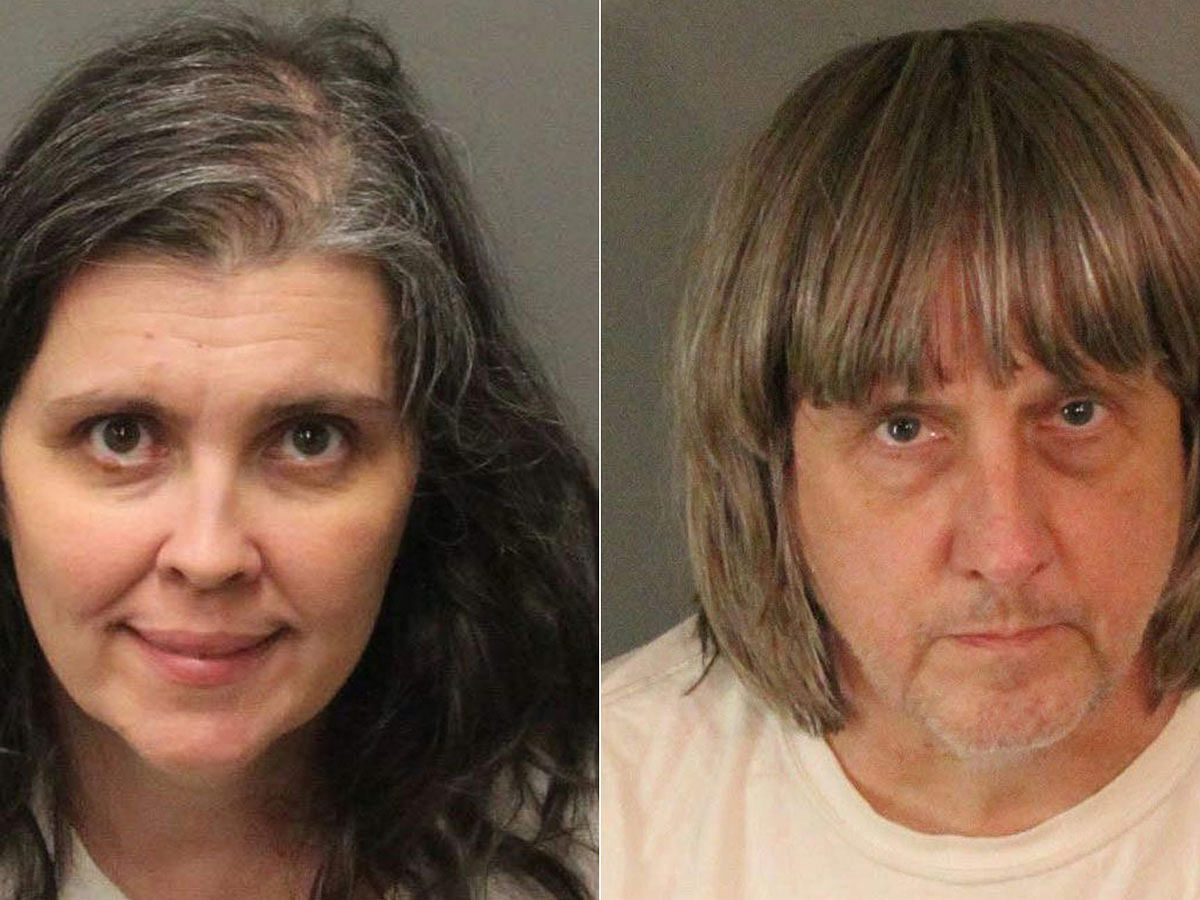This combination of pictures created on 15 January 2018 shows booking photos from the Riverside County Sheriff's Department of David Allen Turpin (R) and Louise Anna Turpin. Photo: AFP