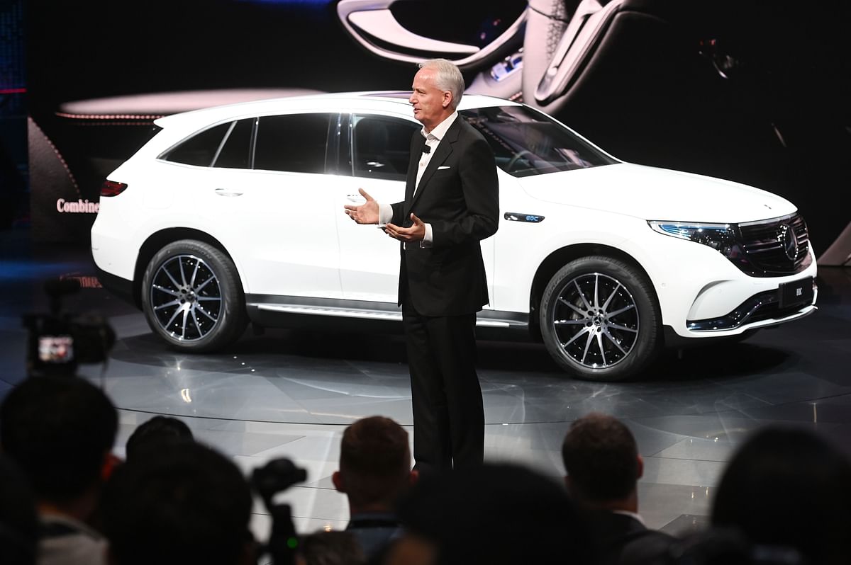 Hubertus Troska, member of the board of management of Daimler AG responsible for China, introduces the Mercedes-Benz EQC SUV on the opening day of the Shanghai Auto Show in Shanghai on 16 April, 2019. Photo: AFP