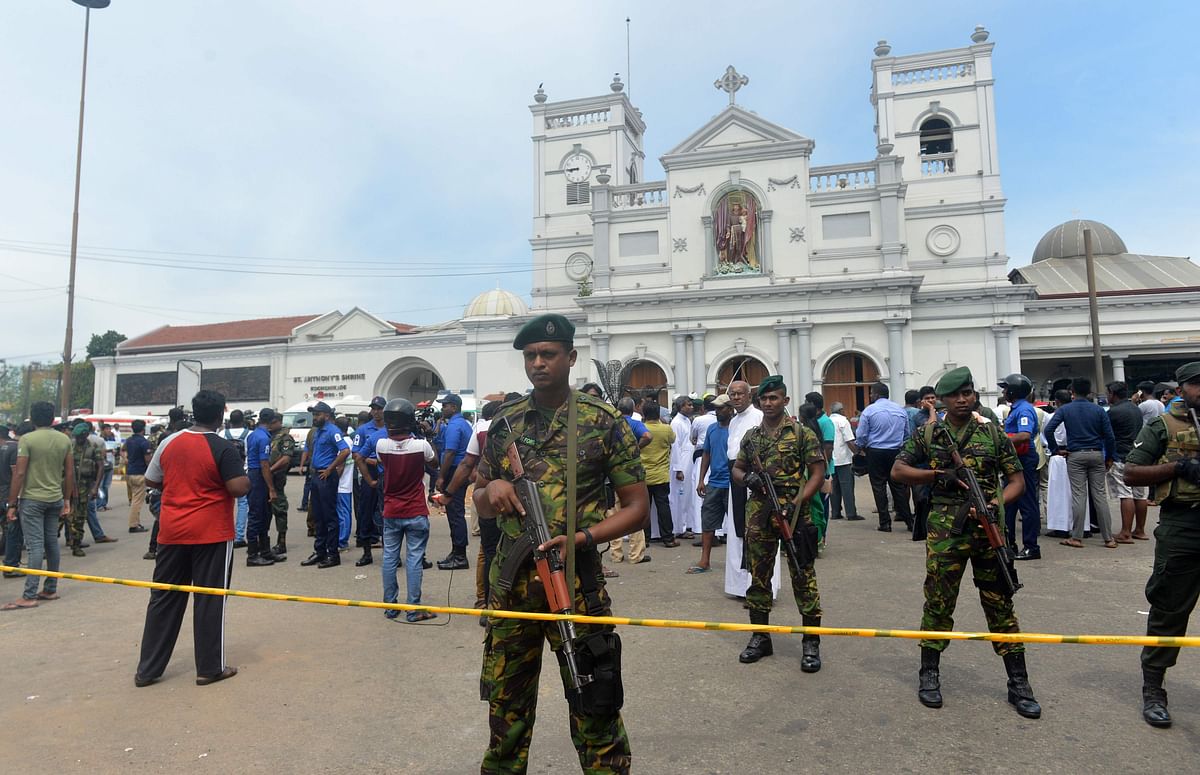 Sri Lankan security personnel keep watch outside the church premises following a blast at the St. Anthony`s Shrine in Kochchikade, Colombo on 21 April 2019. Photo: AFP