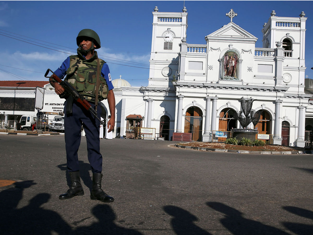 A security officer stands in front of St Anthony`s shrine in Colombo, after bomb blasts ripped through churches and luxury hotels on Easter, in Sri Lanka on 22 April 2019. Photo: Reuters