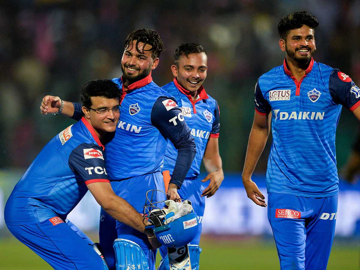 Delhi Capitals team mentor Sourav Ganguly (L) picks up Rishabh Pant (R) as they celebrate after winning the match during the 2019 Indian Premier League (IPL) Twenty20 cricket match between Rajasthan Royals and Delhi Capitals at the Sawai Mansingh Stadium in Jaipur on 22 April, 2019. Photo: AFP