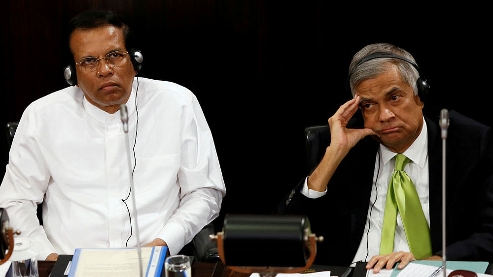 Sri Lanka`s president Maithripala Sirisena and prime minister Ranil Wickremesinghe look on during a parliament session marking the 70th anniversary of Sri LankaÕs Government, in Colombo, Sri Lanka on 3 October 2017. Reuters File Photo