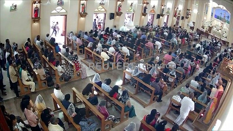 A suspected suicide bomber enters St. Sebastian's Church in Negombo, Sri Lanka 21 April 2019 in this still image taken from a CCTV handout footage of Easter Sunday attacks released on 23 April 2019. CCTV/Siyatha News via Reuters