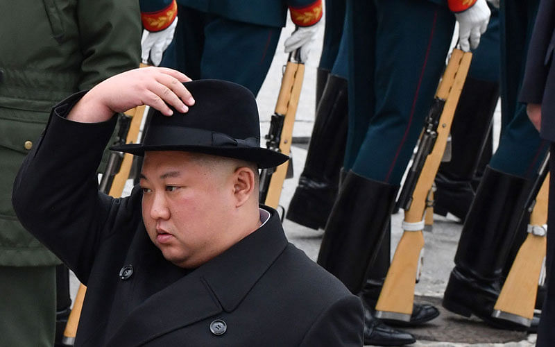 North Korean leader Kim Jong Un attends a wreath-laying ceremony at a WWII memorial in the far-eastern Russian port of Vladivostok on 26 April. Photo: AFP