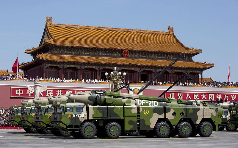 Chinese military vehicles carrying DF-21D anti-ship ballistic missiles travel past Tiananmen Gate during a military parade to commemorate the 70th anniversary of the end of World War II in Beijing on 3 September 2015. Reuters File Photo