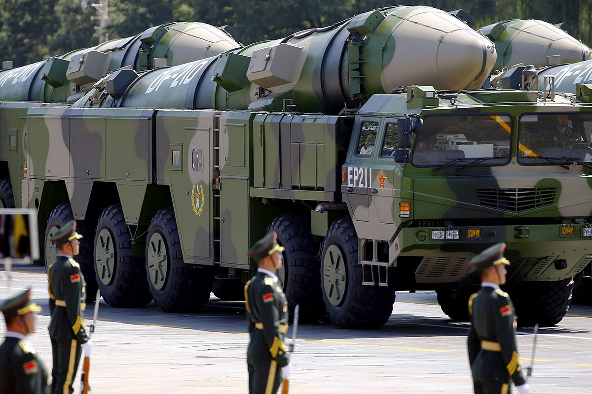 Military vehicles carrying DF-21D ballistic missiles roll to Tiananmen Square during a military parade to mark the 70th anniversary of the end of World War Two, in Beijing, China on 3 September 2015. Photo: Reuters