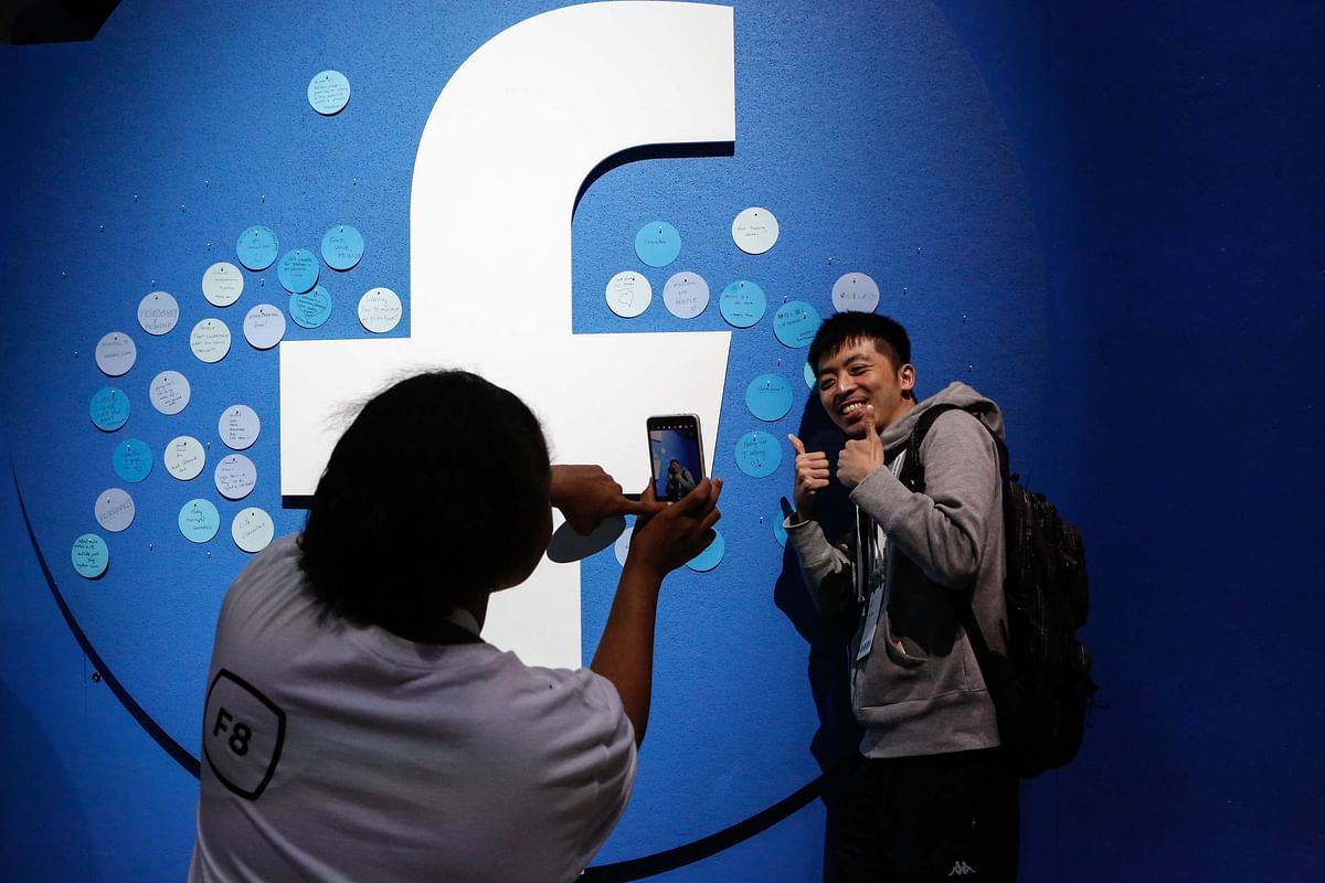 An attendee poses for a picture at the Facebook F8 Conference at McEnery Convention Center in San Jose, California, on 30 April 2019. Photo: AFP