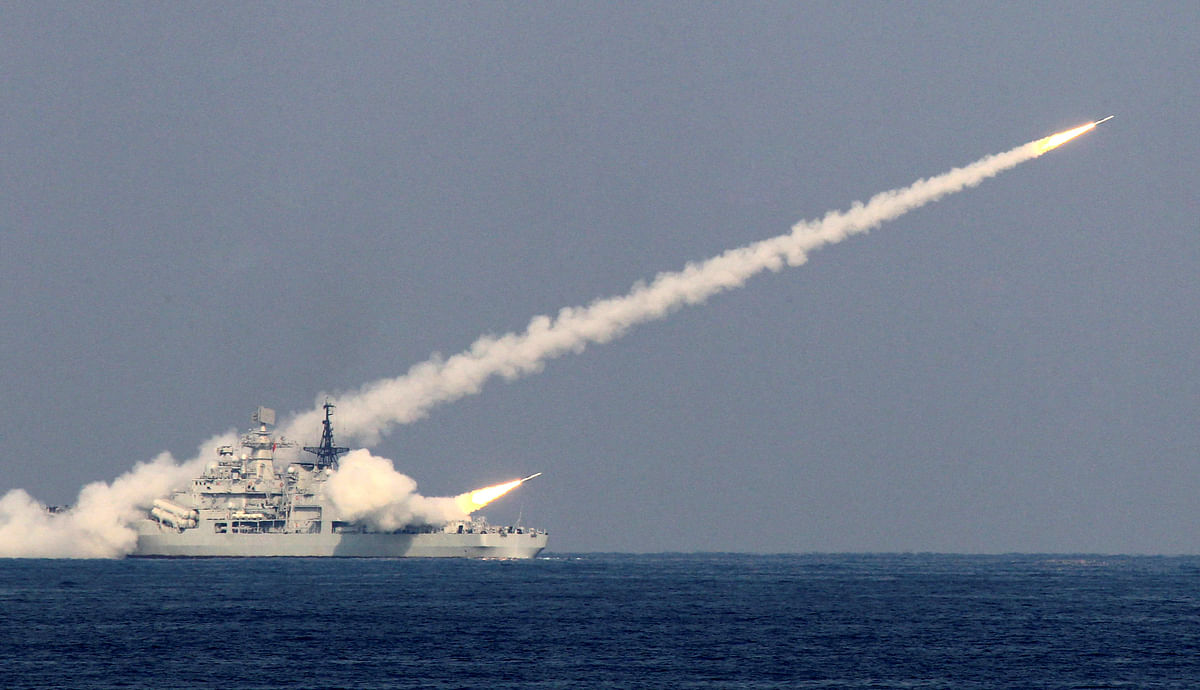 Guided missiles are launched during a drill of the North Sea Fleet in Qingdao. Photo: Reuters
