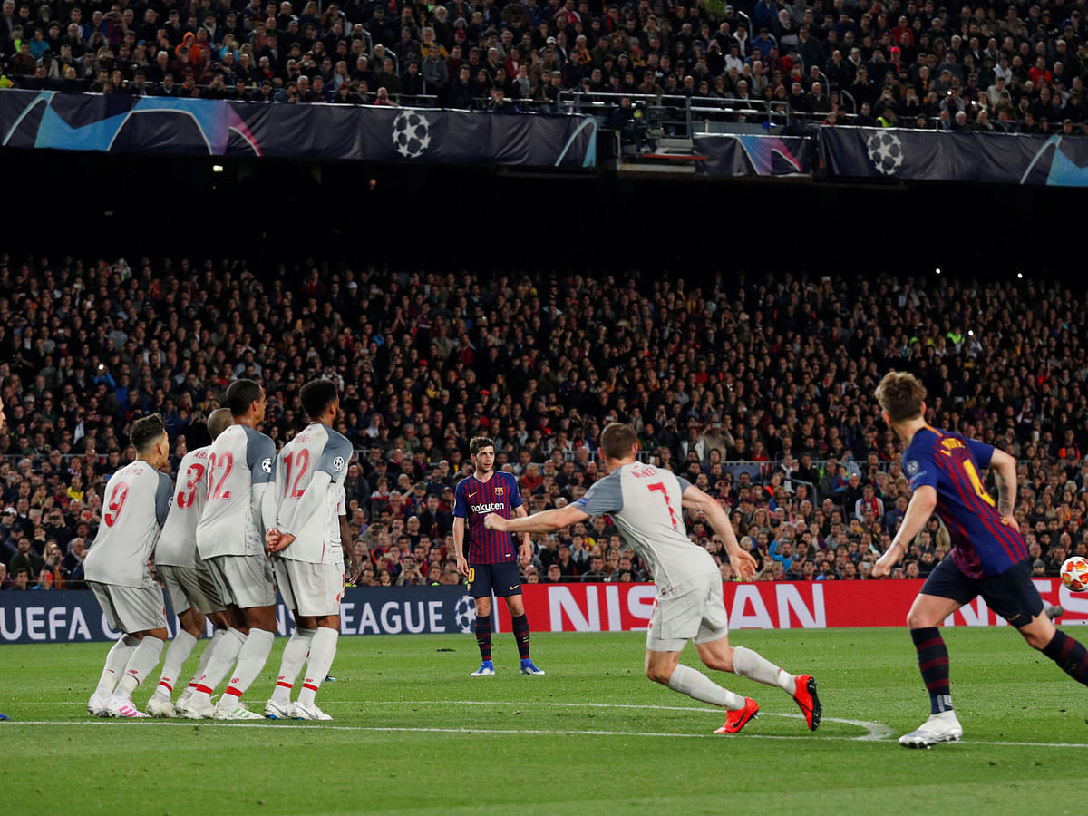Barcelona`s Lionel Messi scores their third goal from a free kick in the Champions League semi-final first leg match against Liverpool at Camp Nou, Barcelona, Spain on 1 May 2019. Photo: Reuters