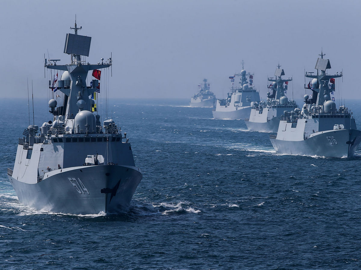 A fleet of ships sail out at sea as China and Russia`s naval joint drill concludes in Zhanjiang. Photo: Reuters
