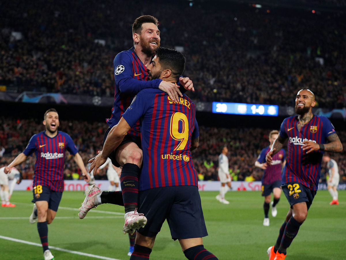 Barcelona`s Lionel Messi celebrates scoring their second goal with Luis Suarez and team mates in the Champions League semi-final first leg match against Liverpool at Camp Nou, Barcelona, Spain on 1 May 2019. Photo: Reuters