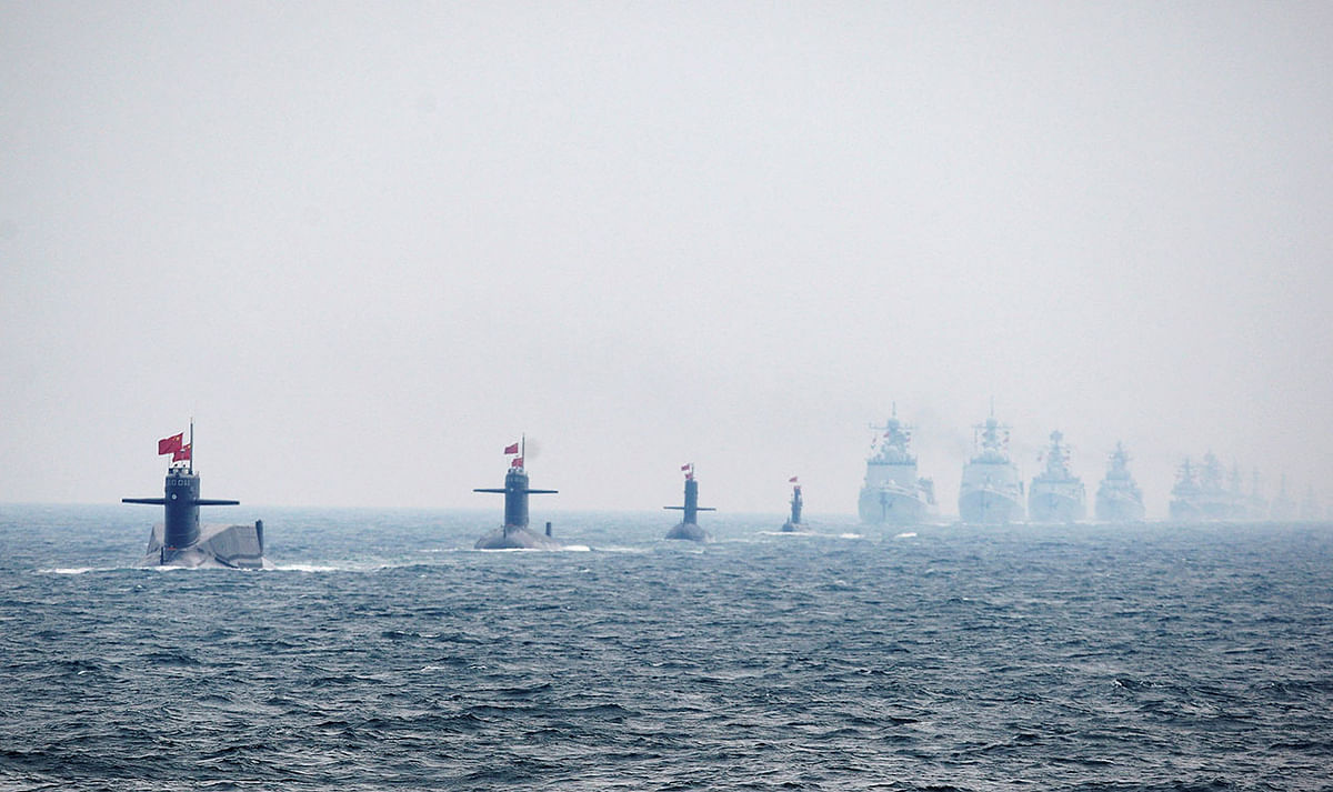 Chinese Navy submarines and warships take part in an international fleet review to celebrate the 60th anniversary of the founding of the People`s Liberation Army Navy in Qingdao. Photo: Reuters