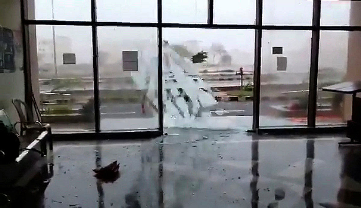 A glass door shatters during Cyclone Fani in Bhubaneswar, Odisha, India on 3 May 2019 in this still image taken from a video obtained from social media. Reuters