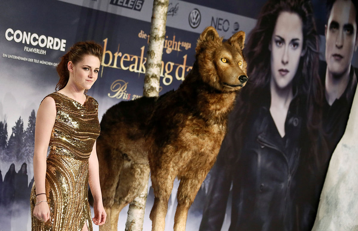 Cast member Kristen Stewart poses for pictures before the German premiere of The Twilight Saga: Breaking Dawn Part 2 in Berlin on 16 November 2012. Photo: Reuters